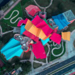 Aerial view of the colorful Biomuseo in Panama City, designed by Frank Gehry