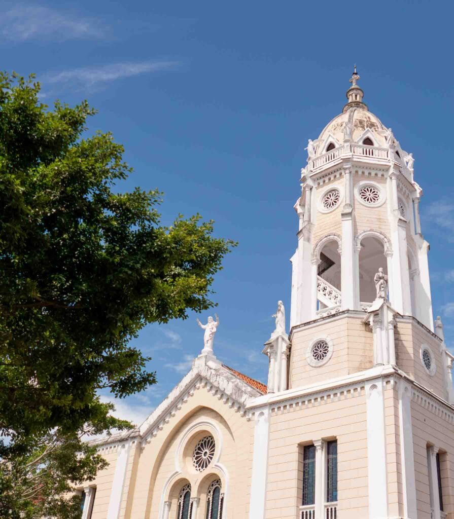 Metropolitan Cathedral Basilica in Casco Viejo with blue sky and bell tower