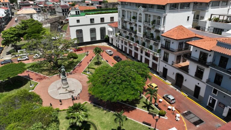 Aerial view of Plaza Tomás Herrera with statue, gardens, and surrounding colonial buildings in Casco Viejo, Panama
