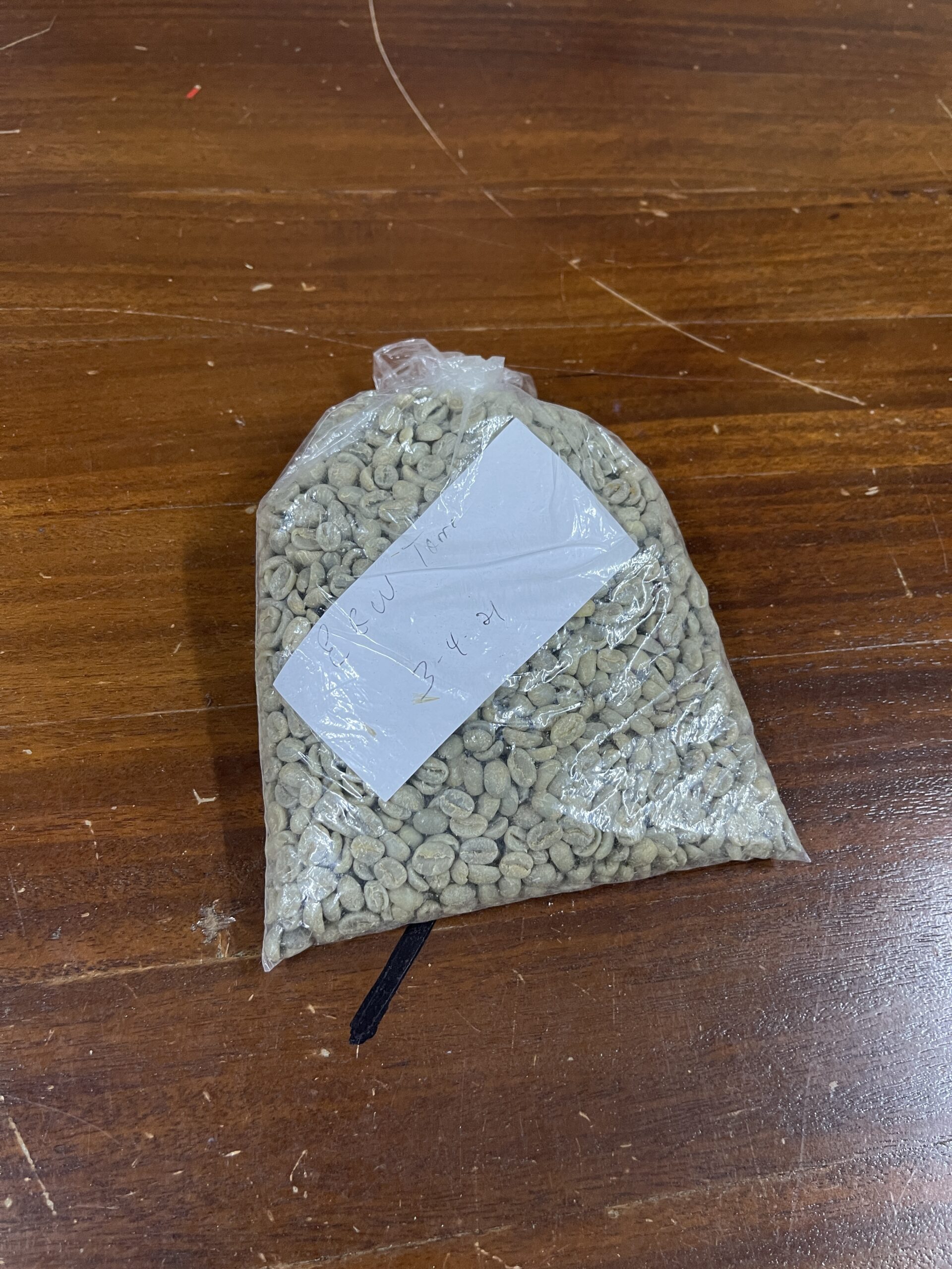 Unroasted Geisha coffee beans before roasting