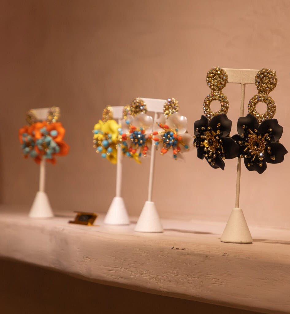 Handmade statement earrings by Michelle Ferrer on display in Casco Viejo boutique