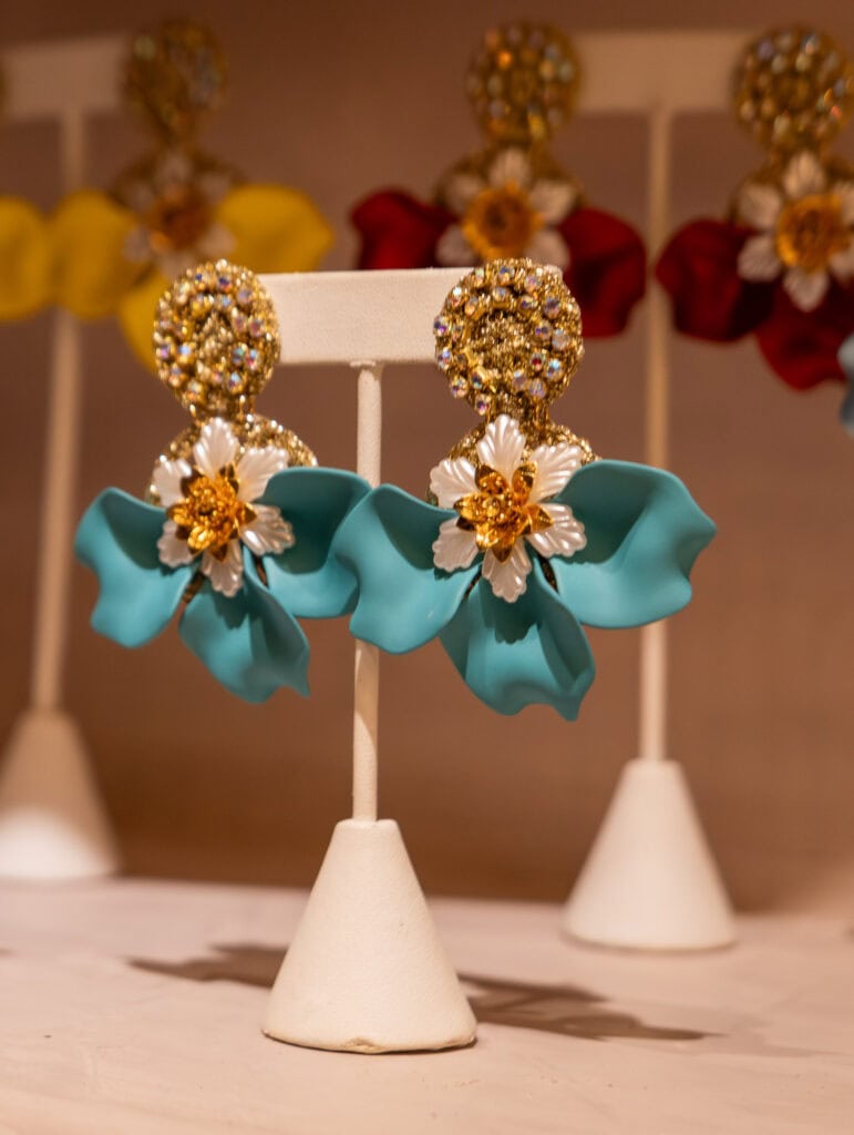 Handmade floral earrings by Michelle Ferrer displayed in a Casco Viejo boutique