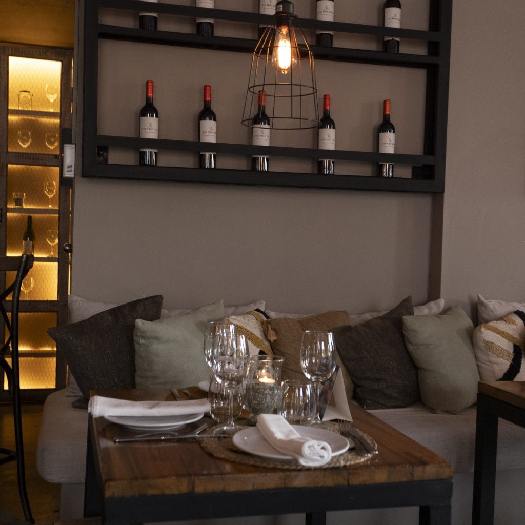 Santa Rita Casco Viejo cozy corner dining table with wine display