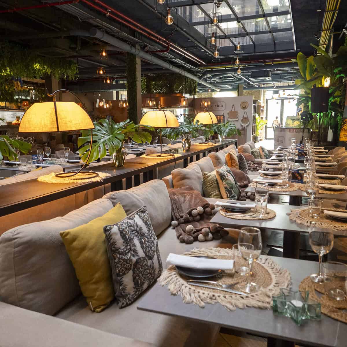 Aya La Vida Casco Viejo dining room with cozy seating and decorated tables