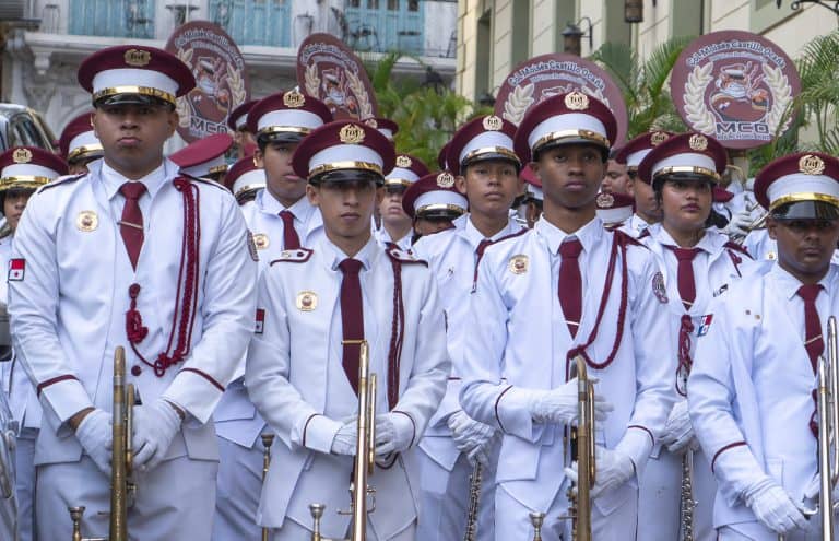 Panama band marching in Casco Viejo during a cultural parade.
