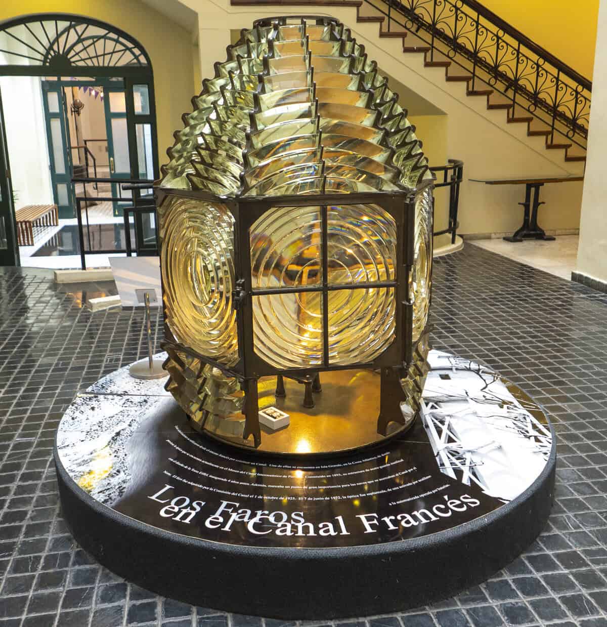 Historic French lighthouse lens at the Panama Canal Museum in Casco Viejo, representing the pioneering French attempt to build the Panama Canal in the late 1800s.