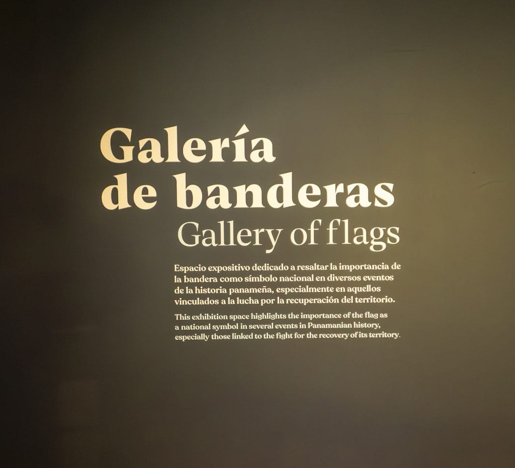 Entrance display for the Gallery of Flags at the Panama Canal Museum in Casco Viejo, honoring the Panamanian flag as a national symbol of sovereignty and identity.