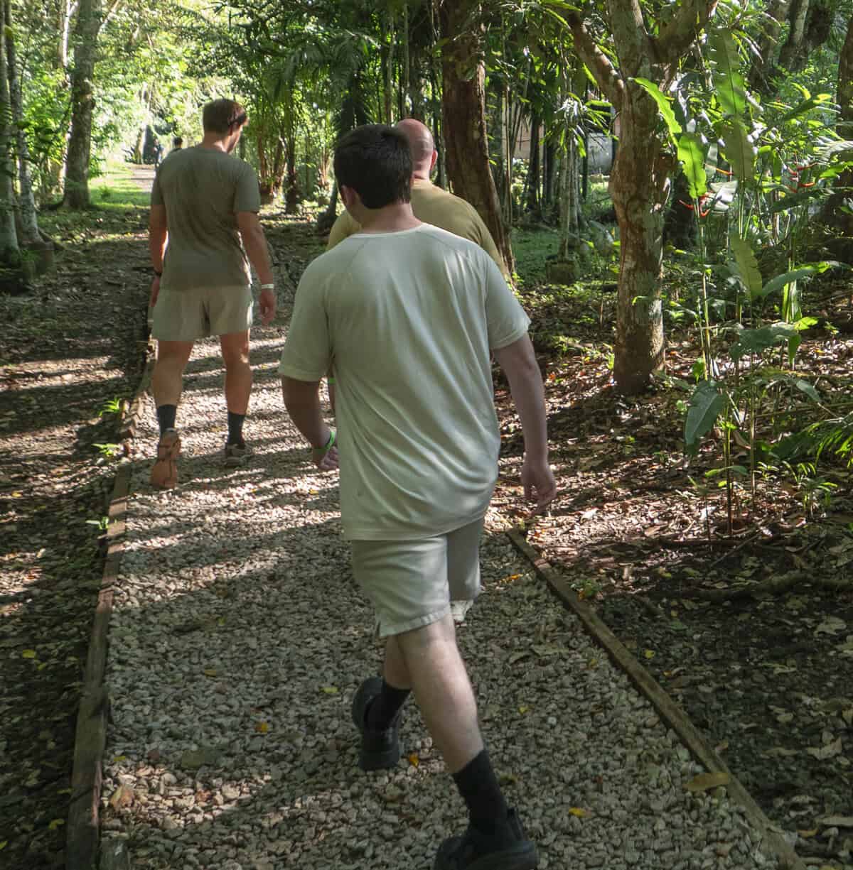Father and son hiking the forest trail at Metropolitan Natural Park Panama City