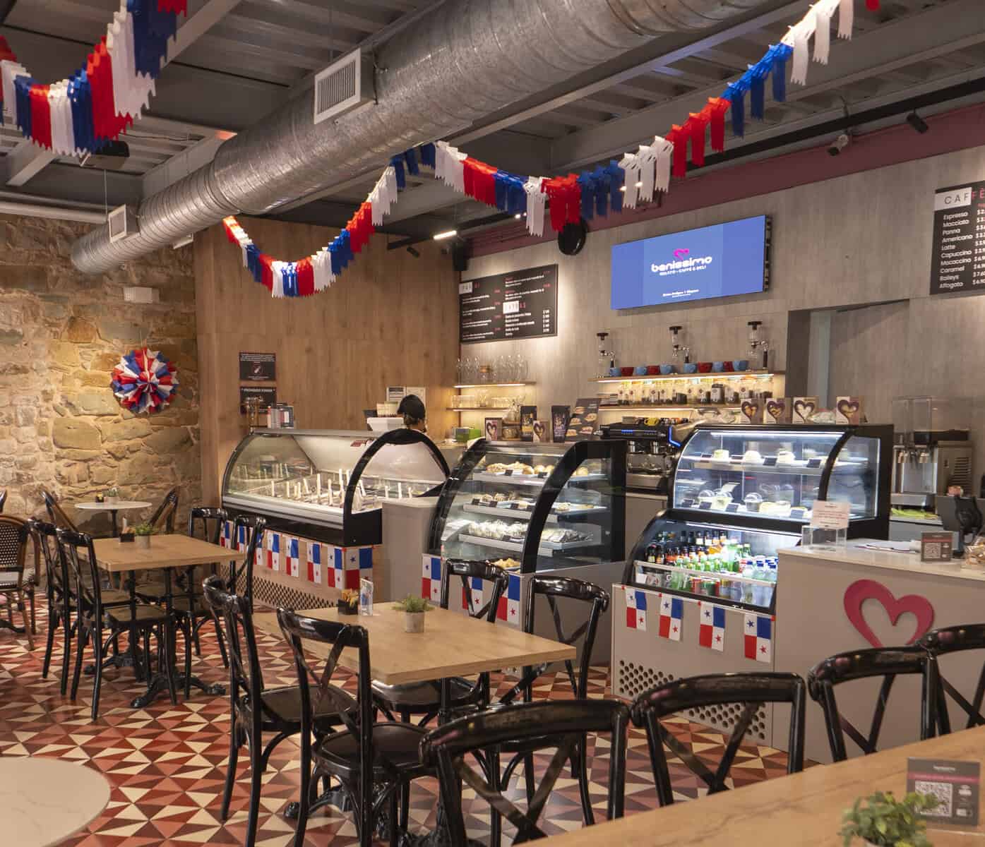 Interior of Benissimo Gelato Café in Casco Viejo Panama with tables and gelato displays