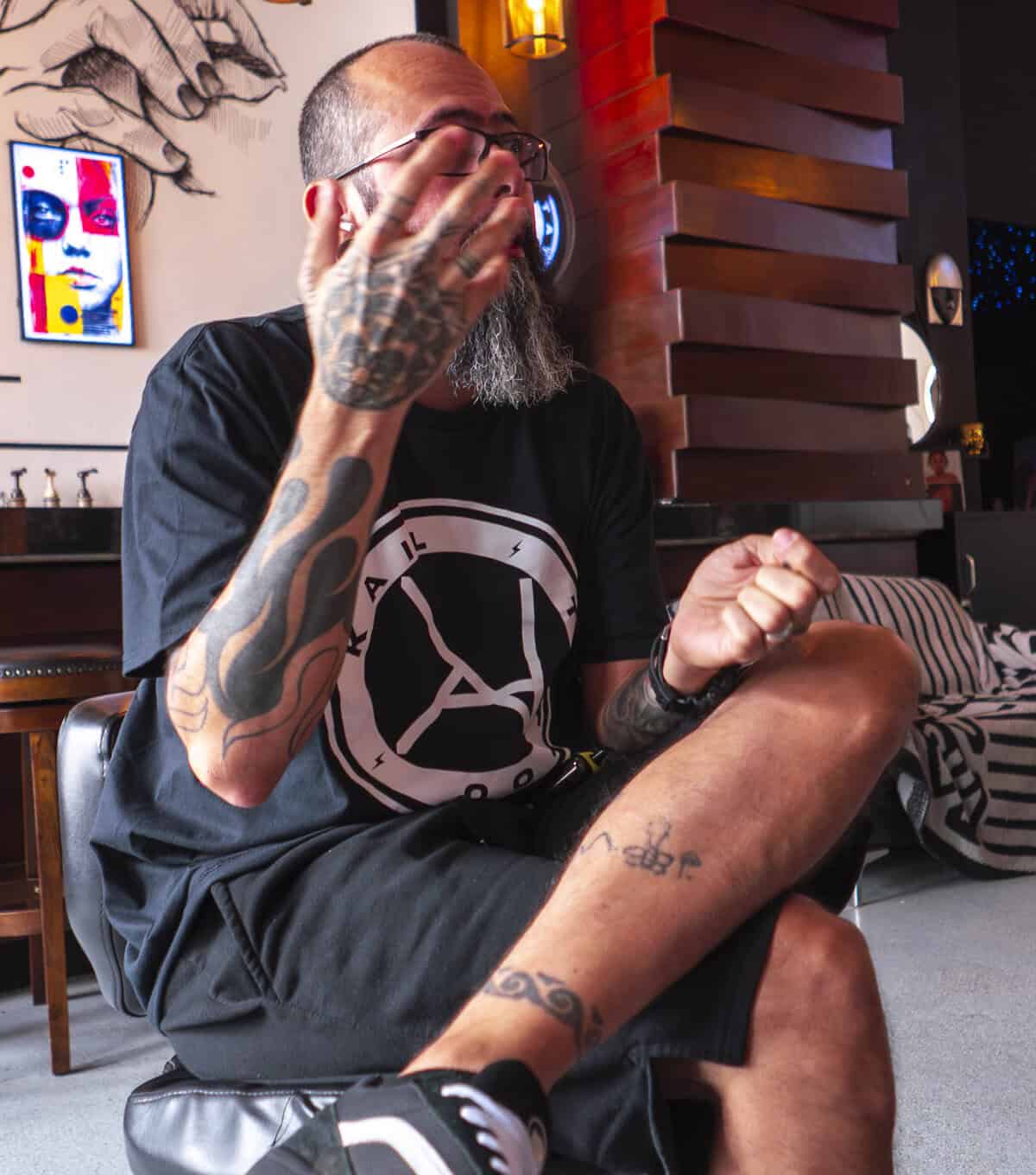 Kail reflecting on the philosophy behind his tattoo art during an interview at KAIL Tattoo Studio Casco Viejo Panama