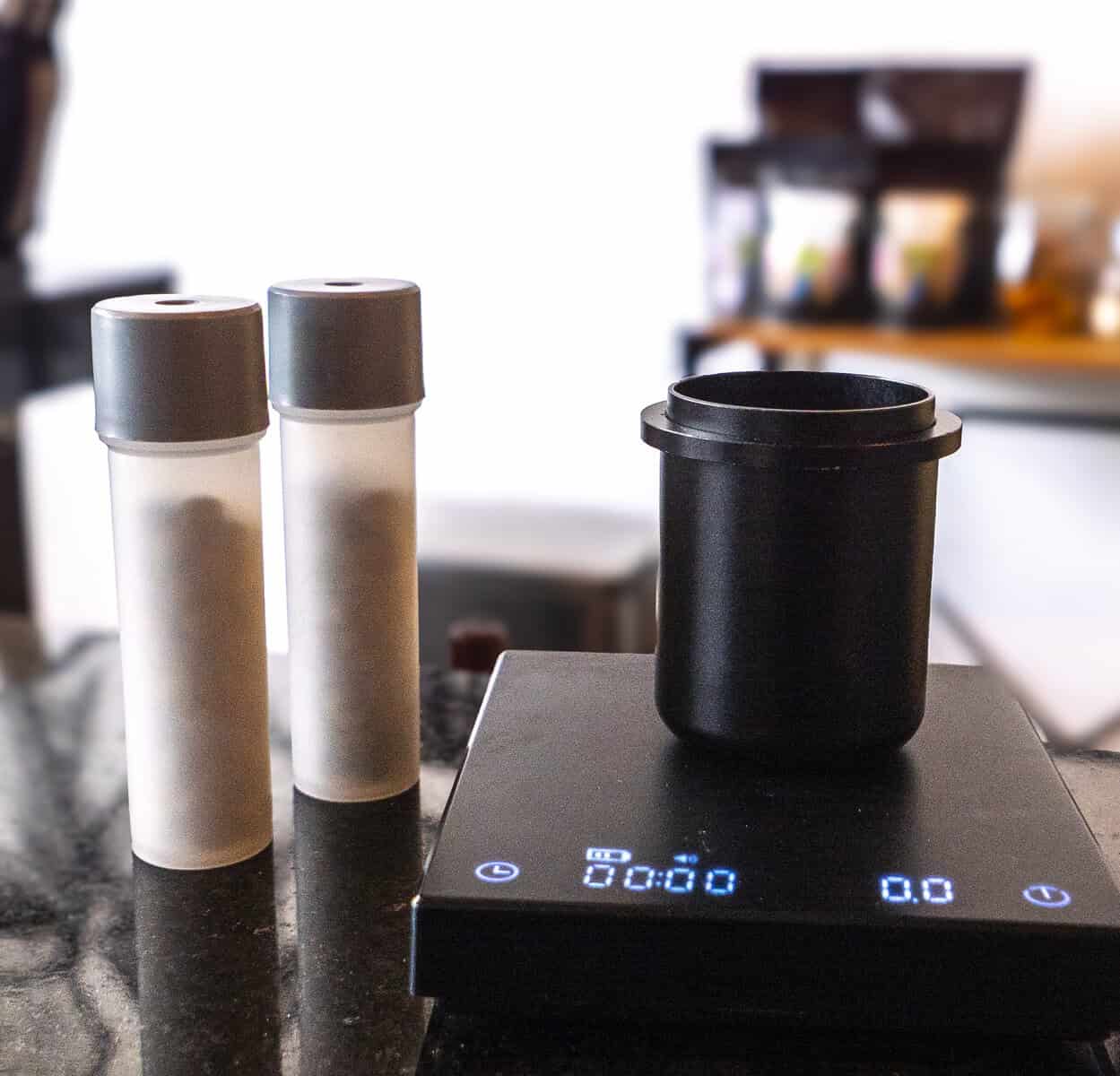 Coffee brewing setup on digital scale at Kail Tattoo Studio & Coffee Bar in Casco Viejo Panama showing precision and balance.