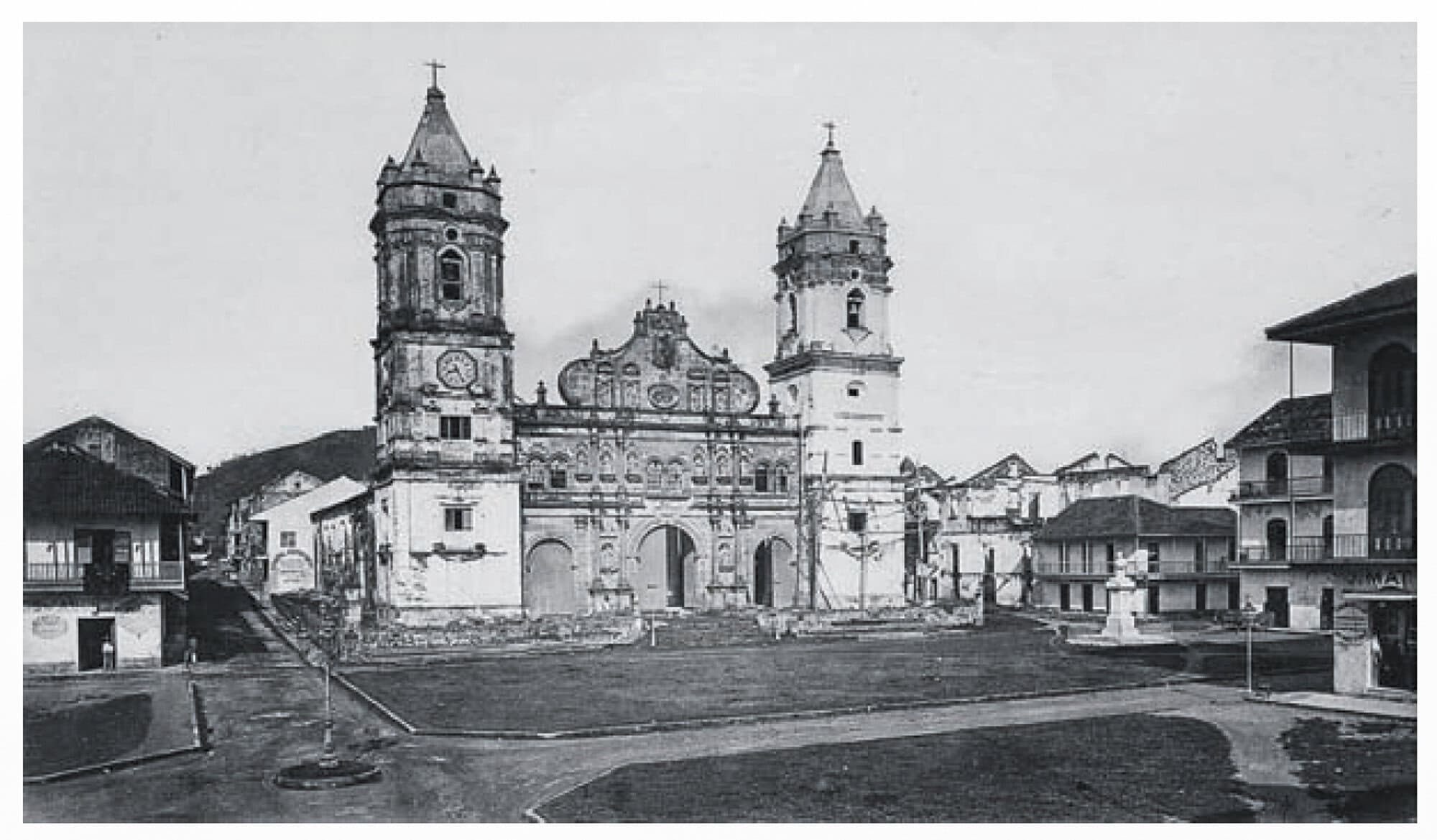 Historic black and white photograph of the Metropolitan Cathedral in Casco Viejo, Panama, showing its twin bell towers and stone façade in the early 1900s.