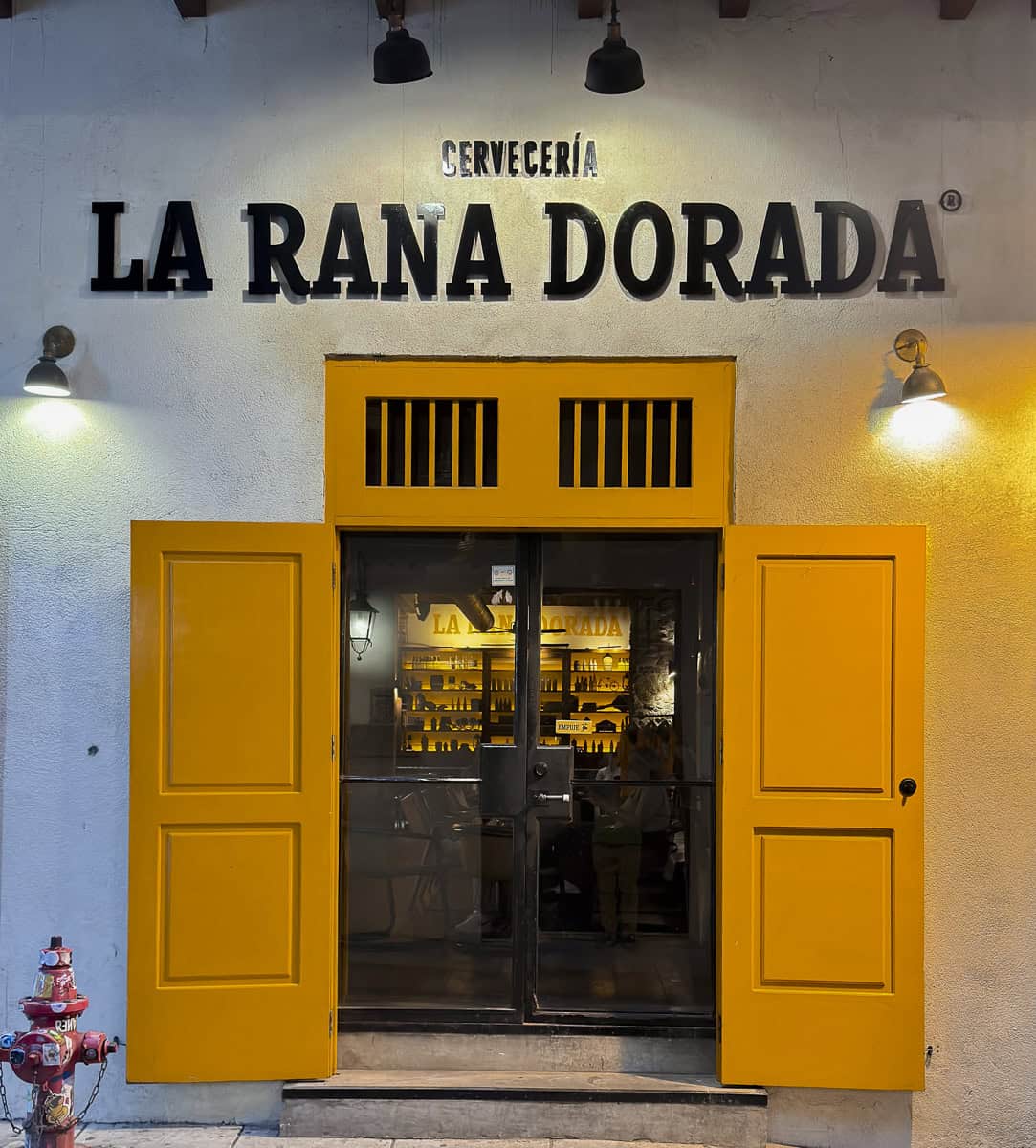 La Rana Dorada Pub in Casco Viejo Panama with iconic yellow doors and craft beer bar inside