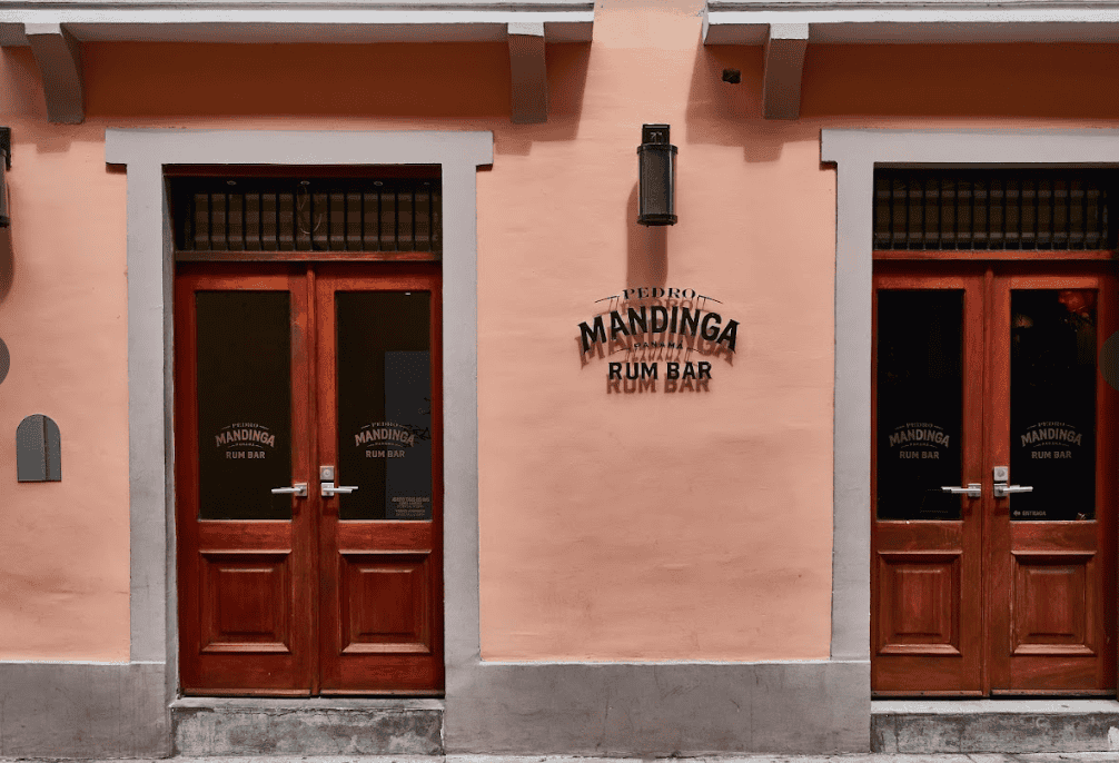 Mandinga Rum Bar exterior in Casco Viejo, Panama with historic facade and wooden doors