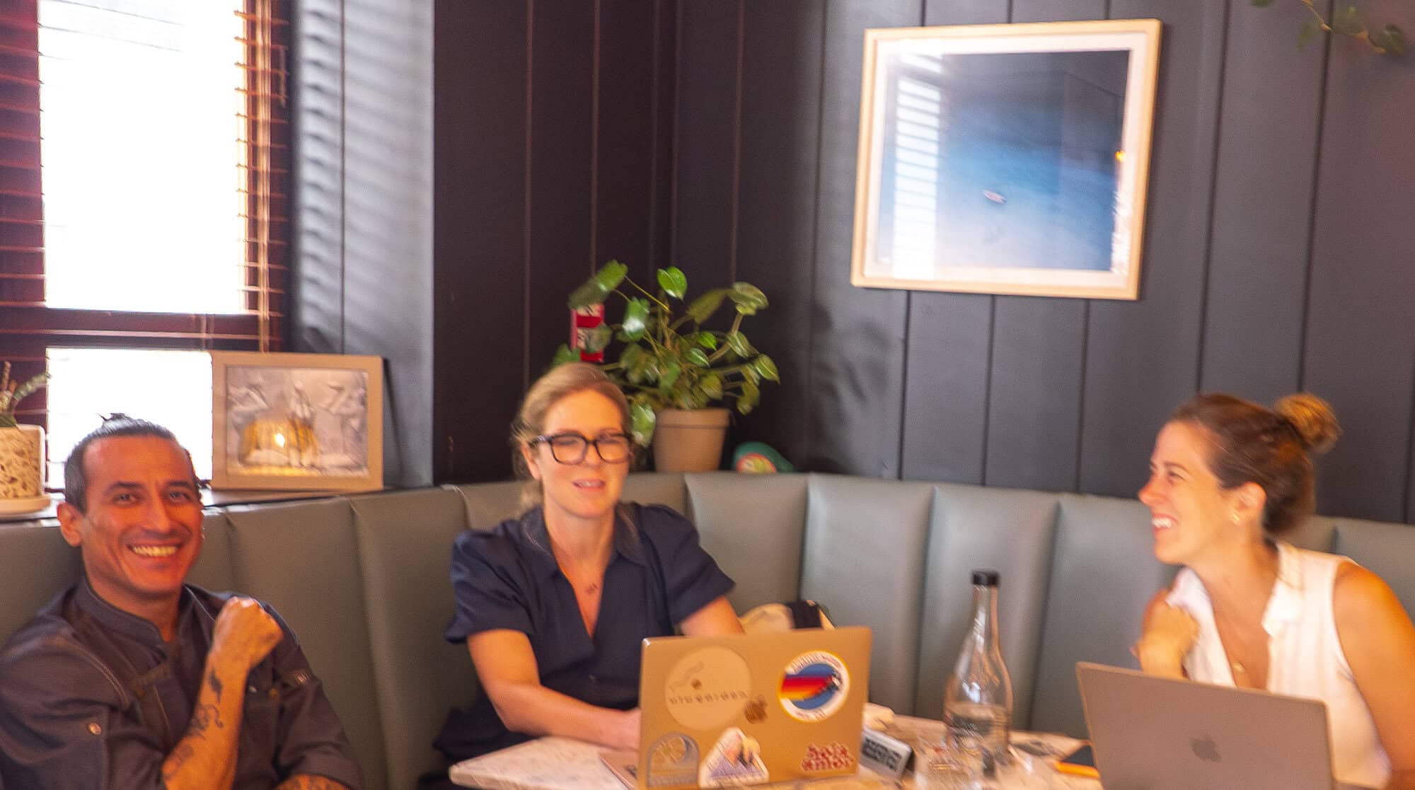 Carlos Lucas López y López Martínez with Emma Morgan and Brittany Morgan during a working moment at Mahalo in Casco Viejo