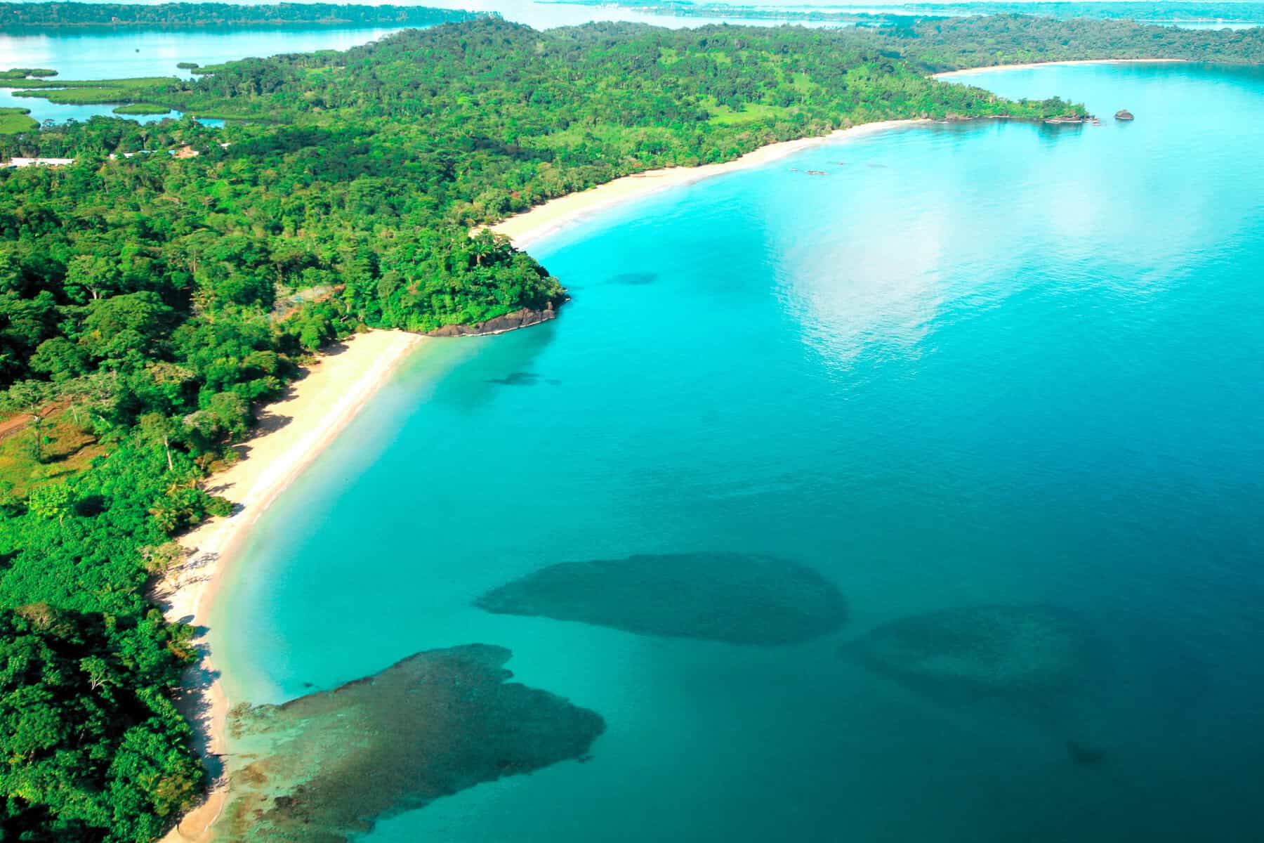 Bocas del Toro Panama aerial coastline Bastimentos island Caribbean turquoise water tropical rainforest beach