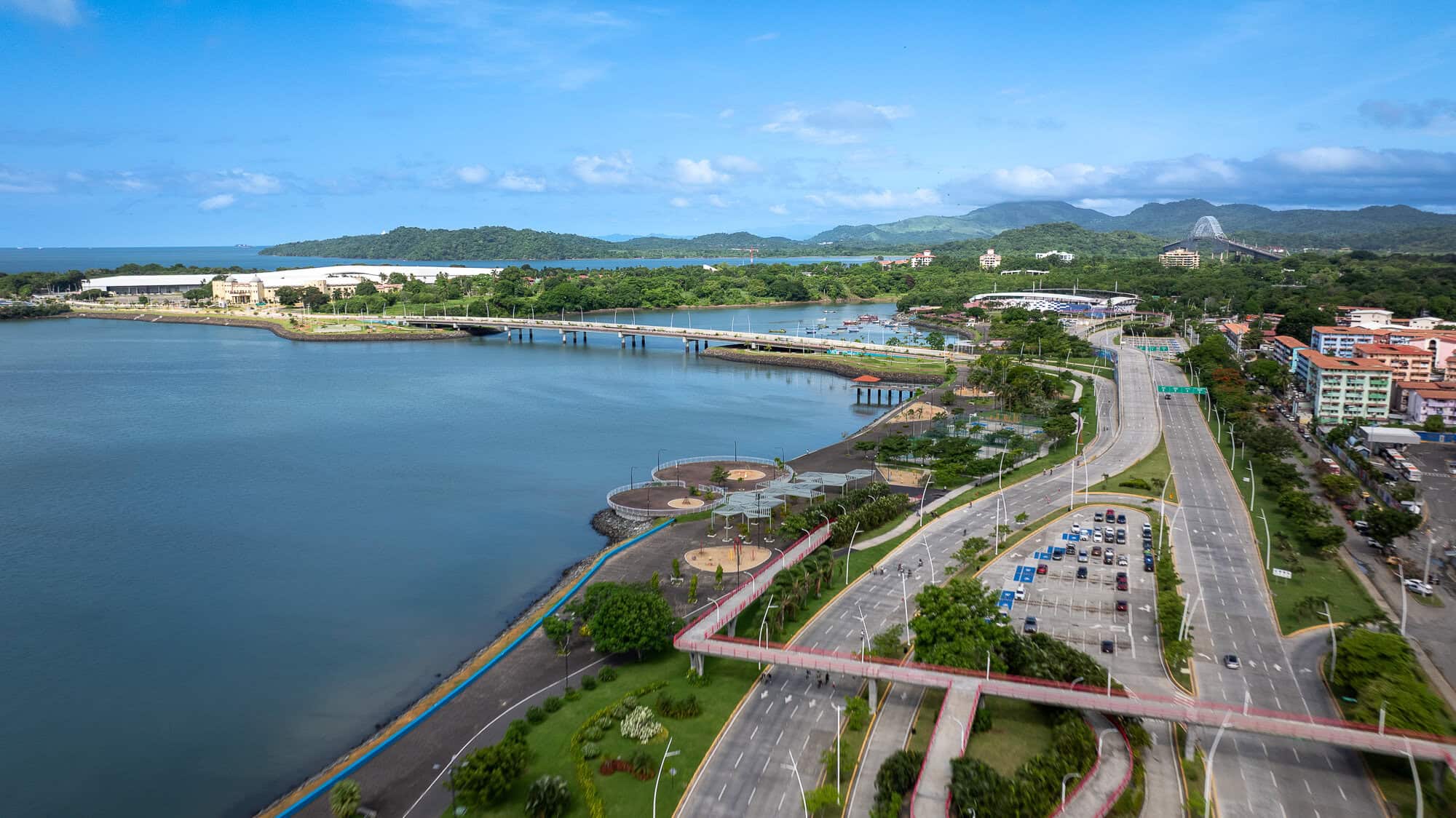 Aerial view of Cinta Costera 3, the Panama Convention Center and the Bridge of the Americas along Panama City's Pacific waterfront.