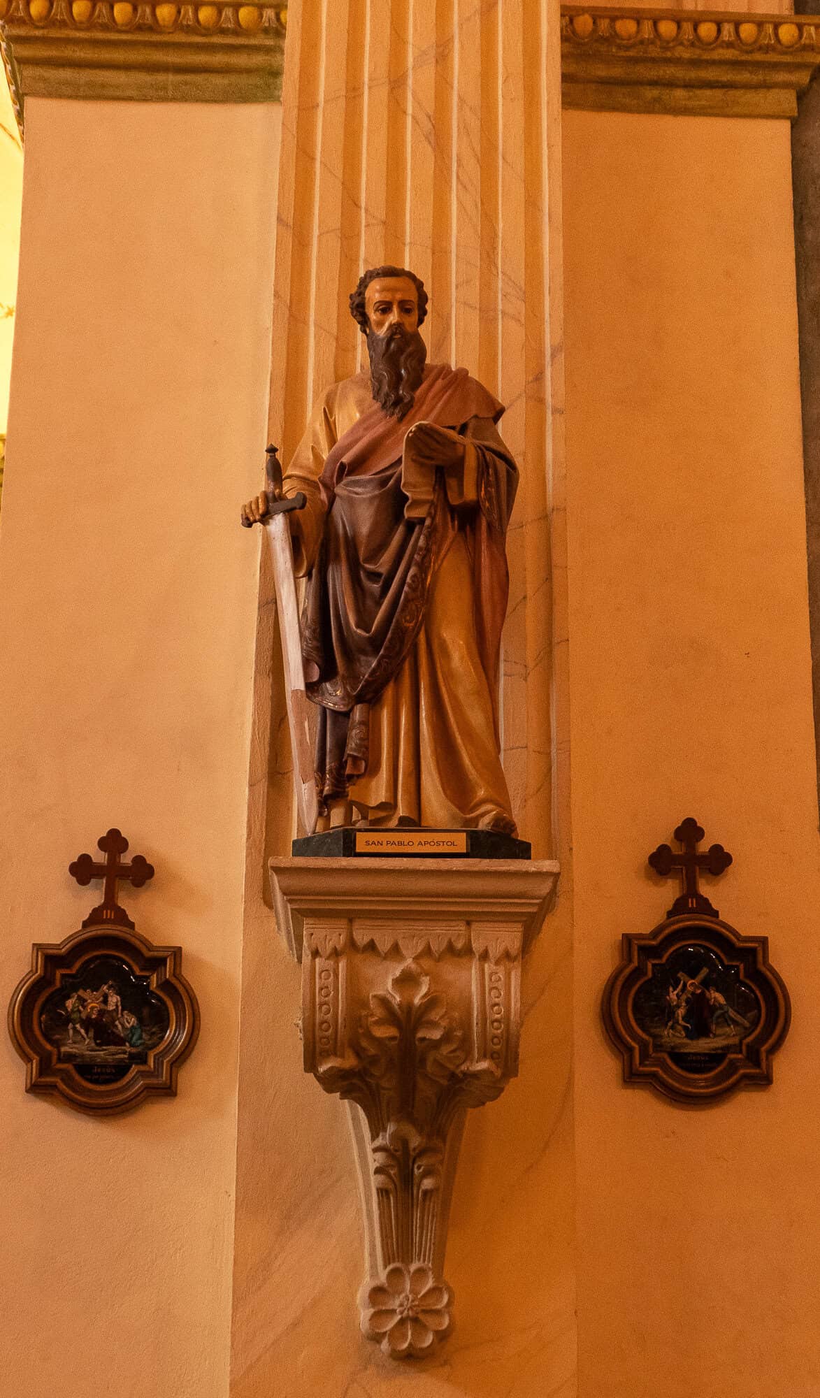 Statue of Saint Paul the Apostle inside the Oratorio San Felipe Neri in Casco Viejo, Panama City, displayed against the church's restored colonial interior.