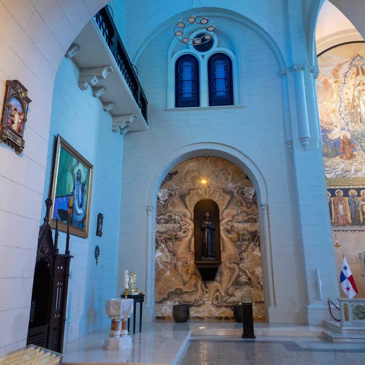 Side chapel with marble niche and religious statue inside San Francisco Church (Iglesia San Francisco de Asís) in Casco Viejo, Panama.