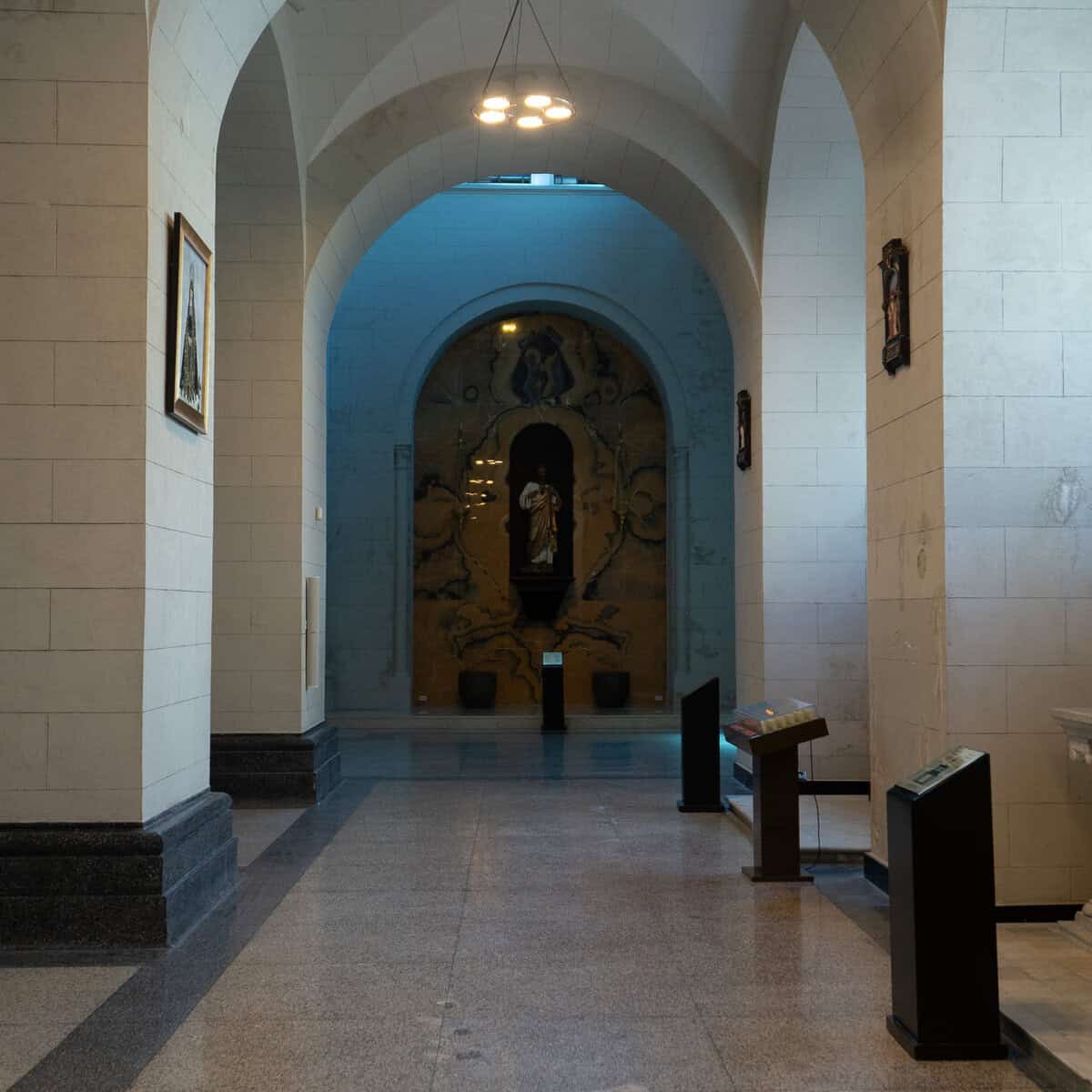 Side corridor and devotional shrine inside San Francisco Church (Iglesia San Francisco de Asís) in Casco Viejo, Panama City.