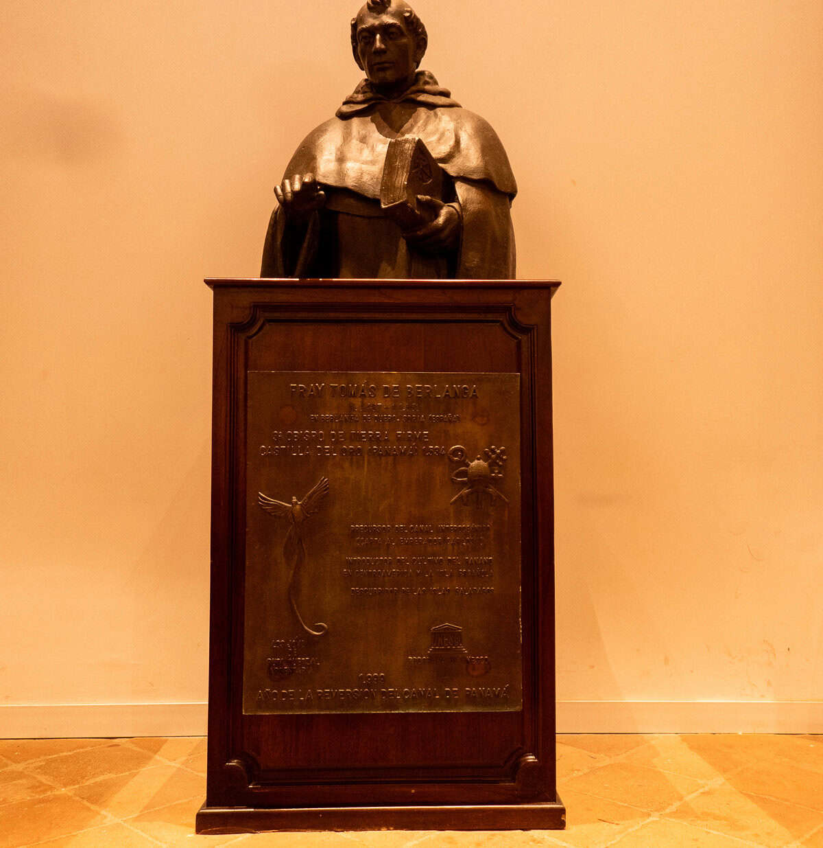 Statue and memorial to a Dominican friar inside Iglesia Santo Domingo de Guzmán in Casco Viejo, Panama City.