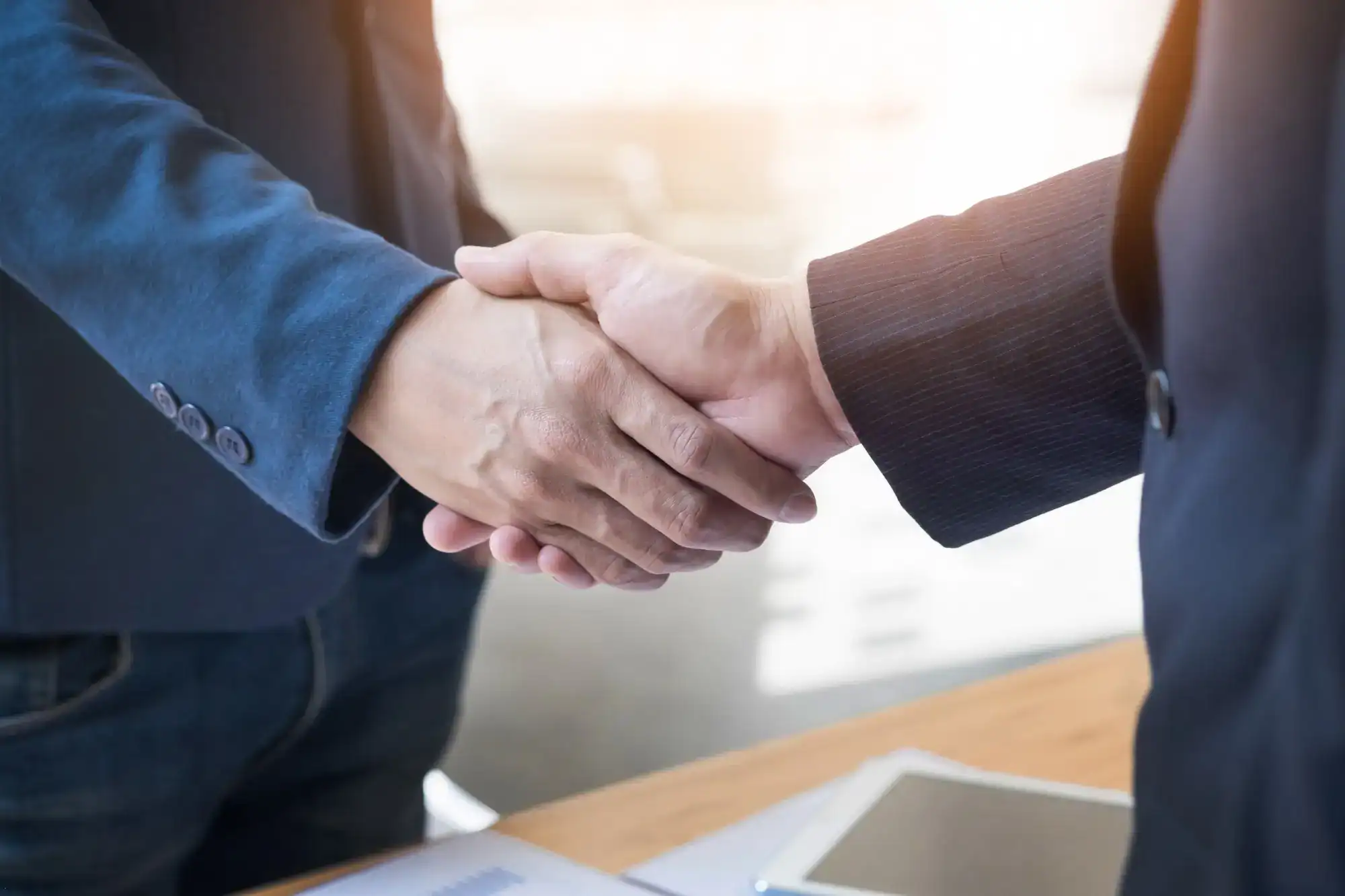 CCTV AMC Services in Dubai - Two Confident Man Shaking Hands