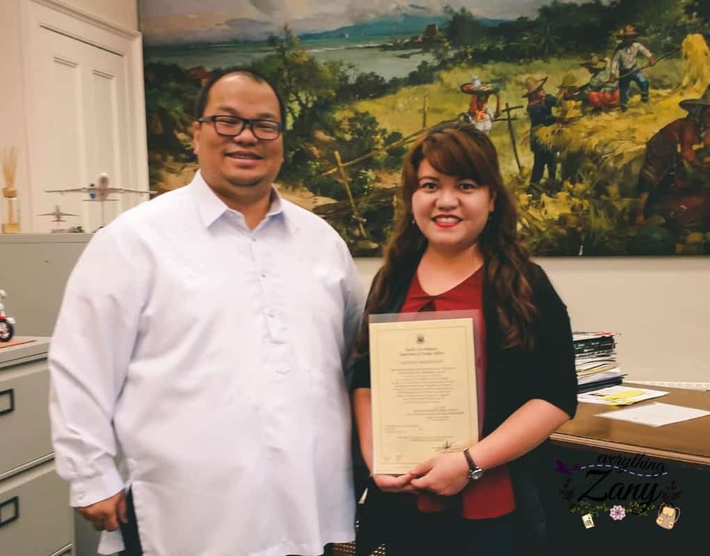 Receiving my Filipino citizenship with the Consul General in London