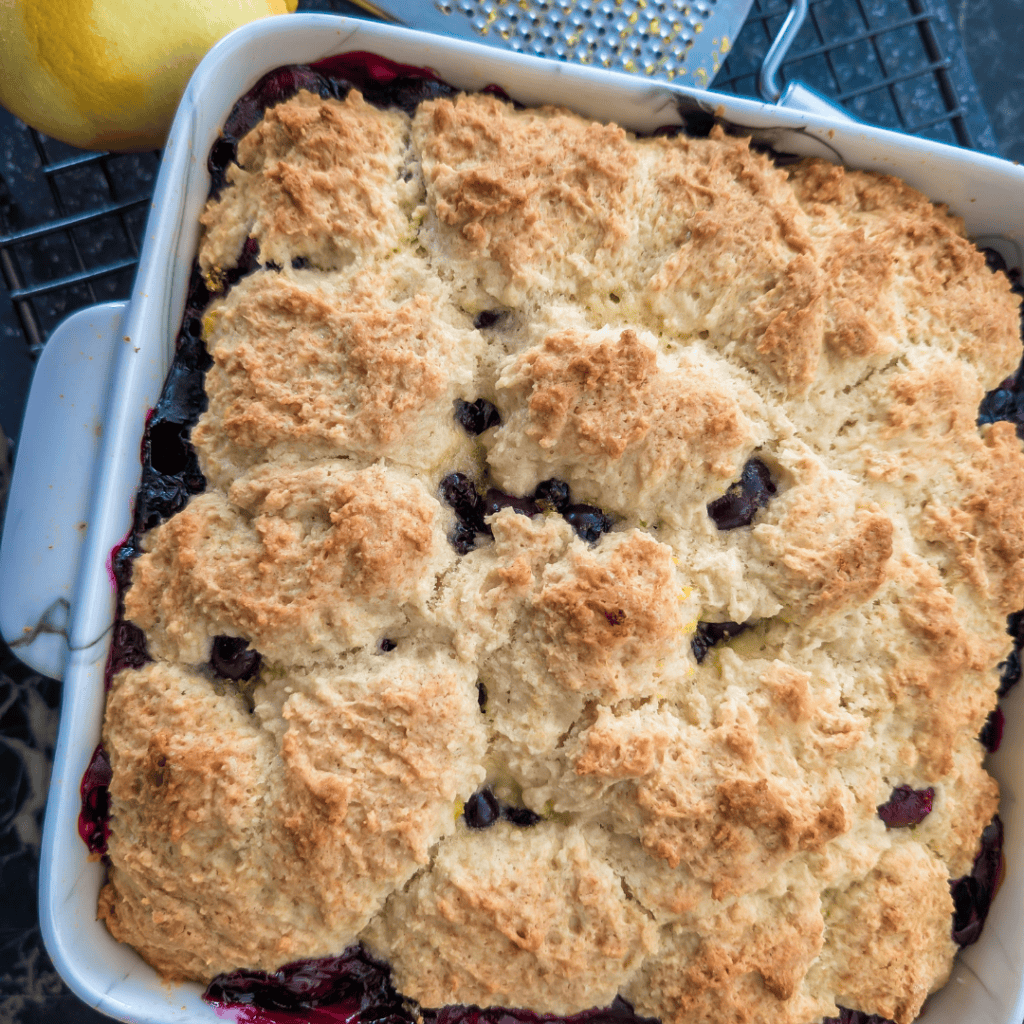 Delicious blueberry lemon crumble squares with golden topping, perfect for dessert or tea time.