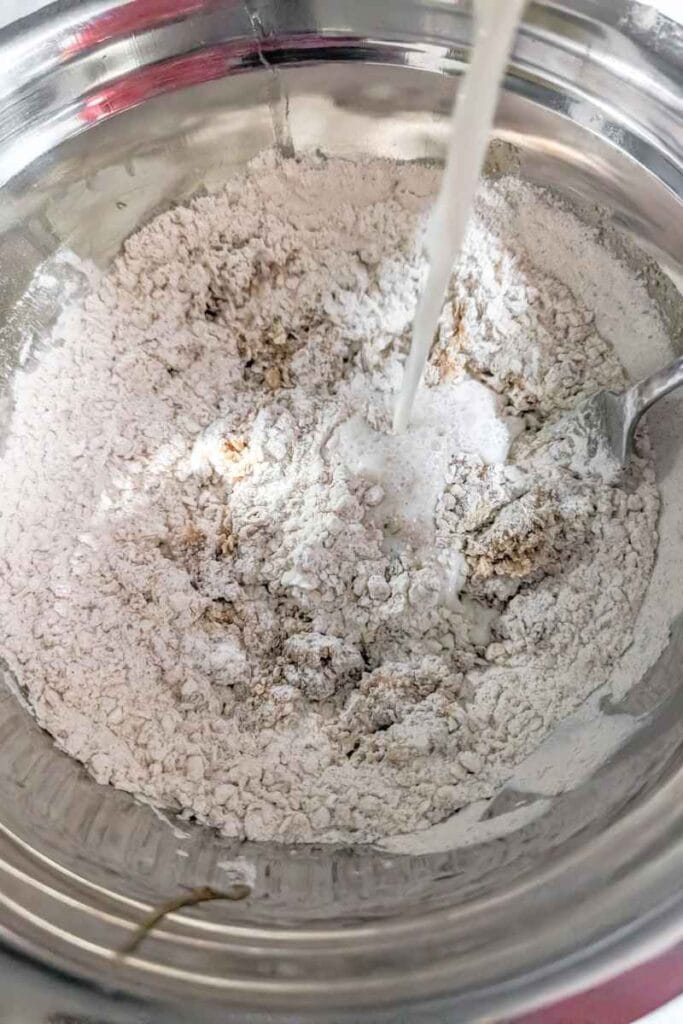 adding milk into the mixture