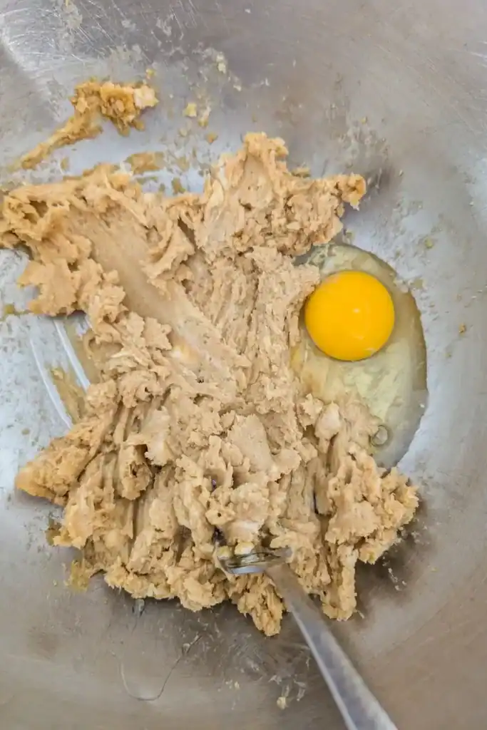 add egg one at a time to cookie dough