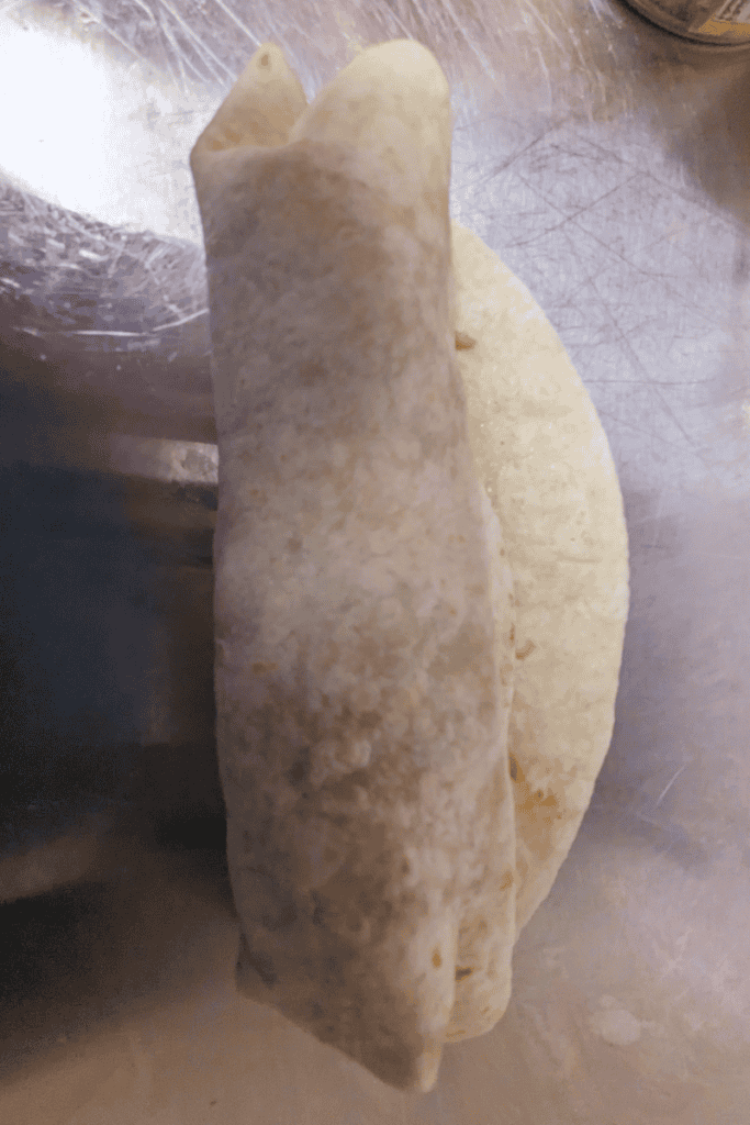 add canned corn and wrap tightly bbq chicken wrap