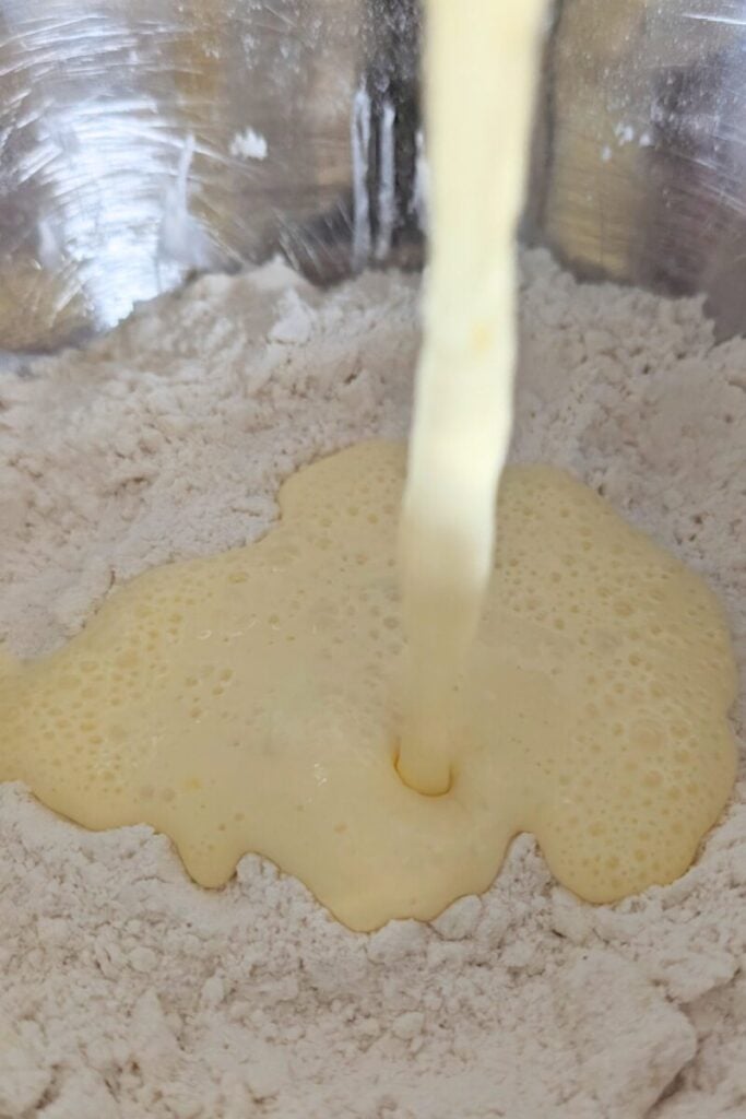 adding egg cream mixture to dry ingredients
