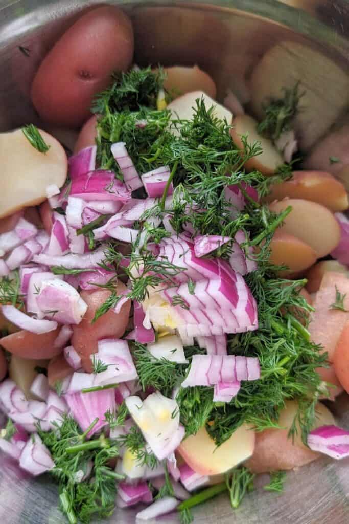 cooked drained mini red potato diced red onion and chopped dillweed