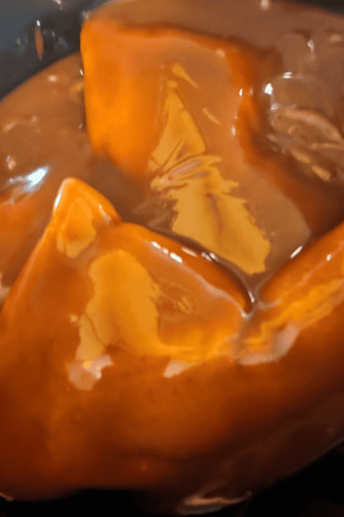 cooking the chicken thighs in crockpot bbq sauce