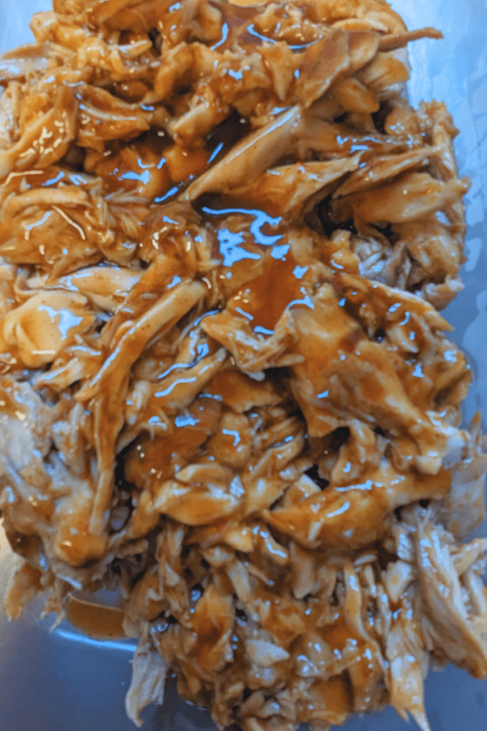 ripped chicken meat with bbq sauce