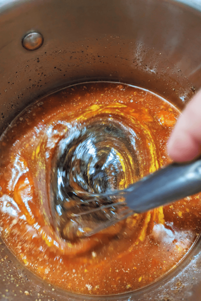 mixing molasses bbq sauce