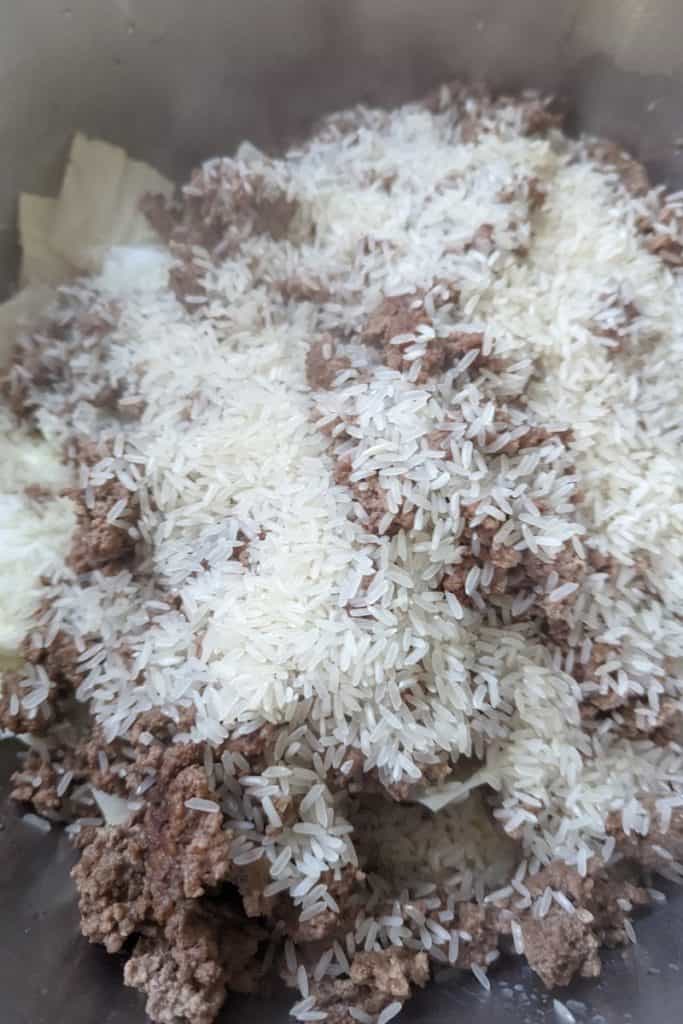 add jasmine rice to beef and cabbage