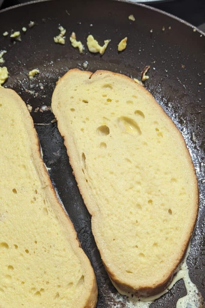 add oil to pan with egged sourdough bread