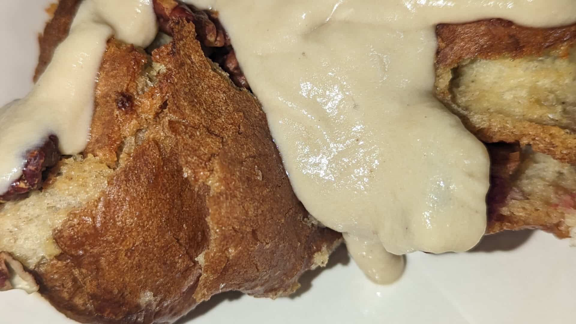 cranberry pecan chai bread pudding with creamy vanilla chai sauce