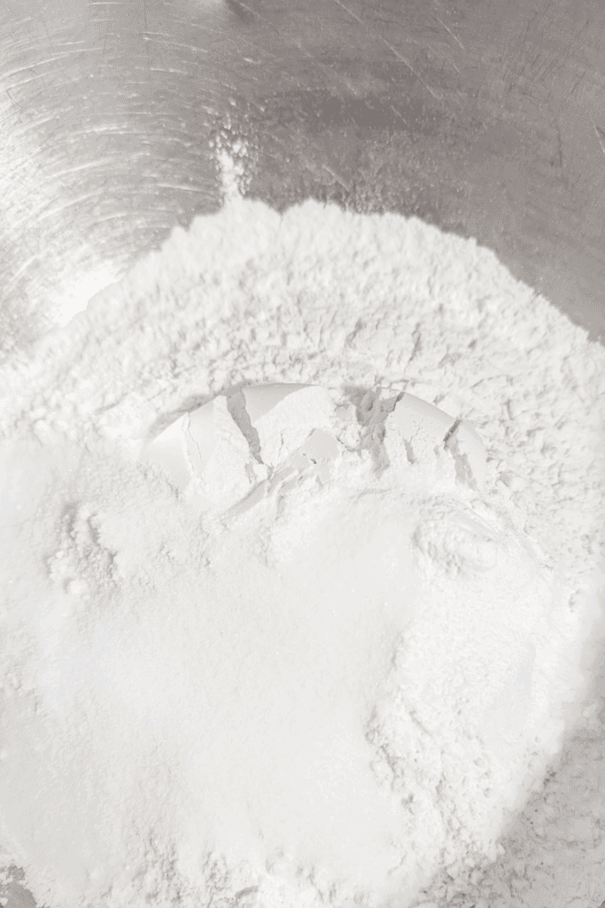 flour sugar baking powder salt in bowl