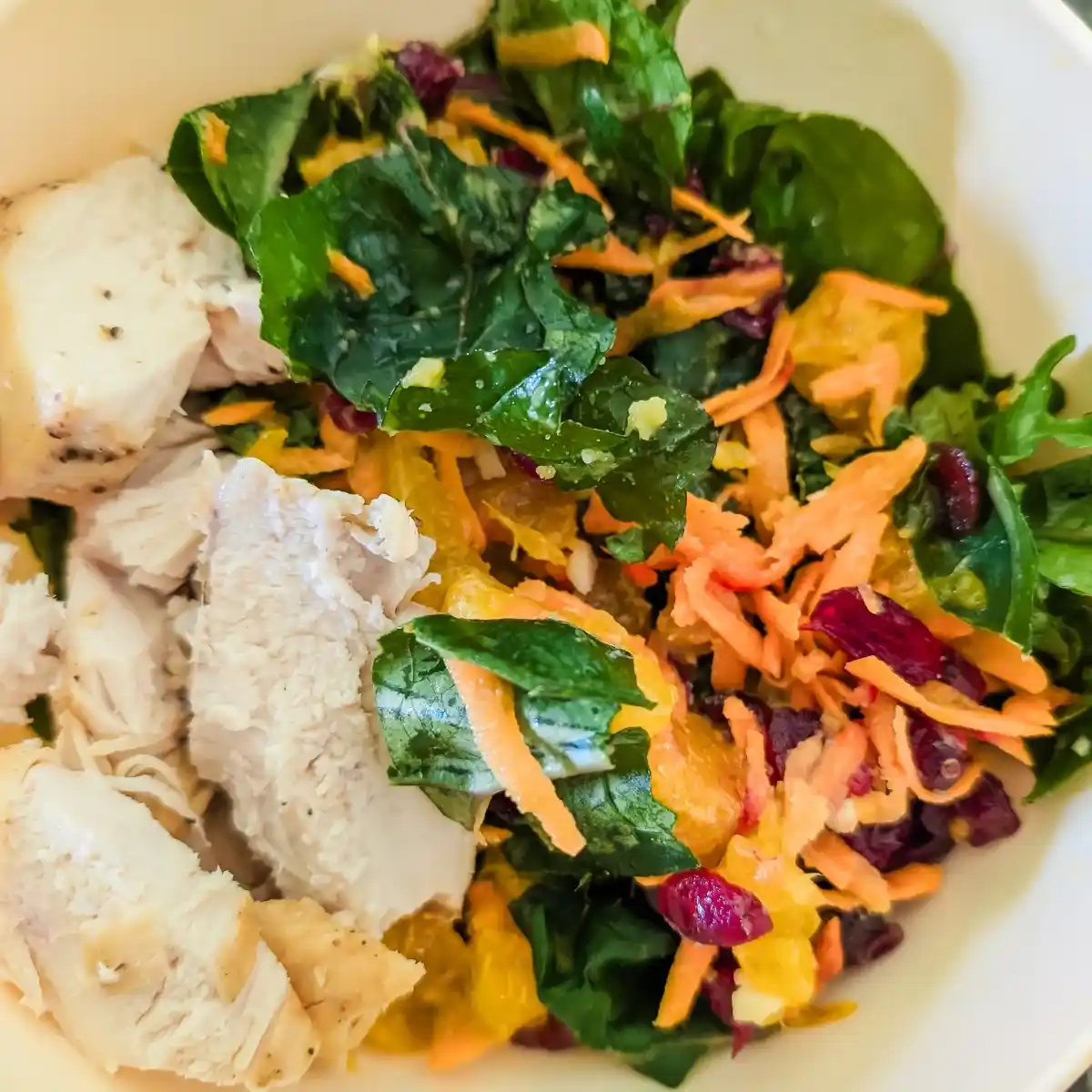 recipe care image of grilled chicken and kale salad