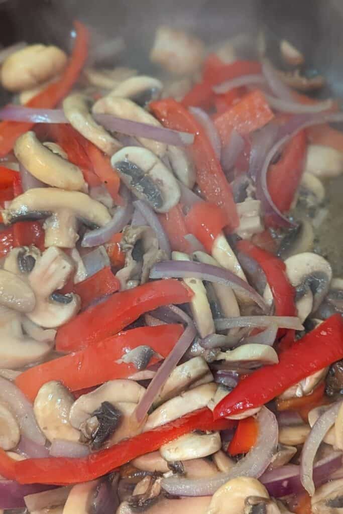sautee the peppers onion and mushrooms down