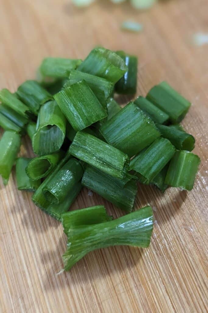 cut green onion stems and set aside