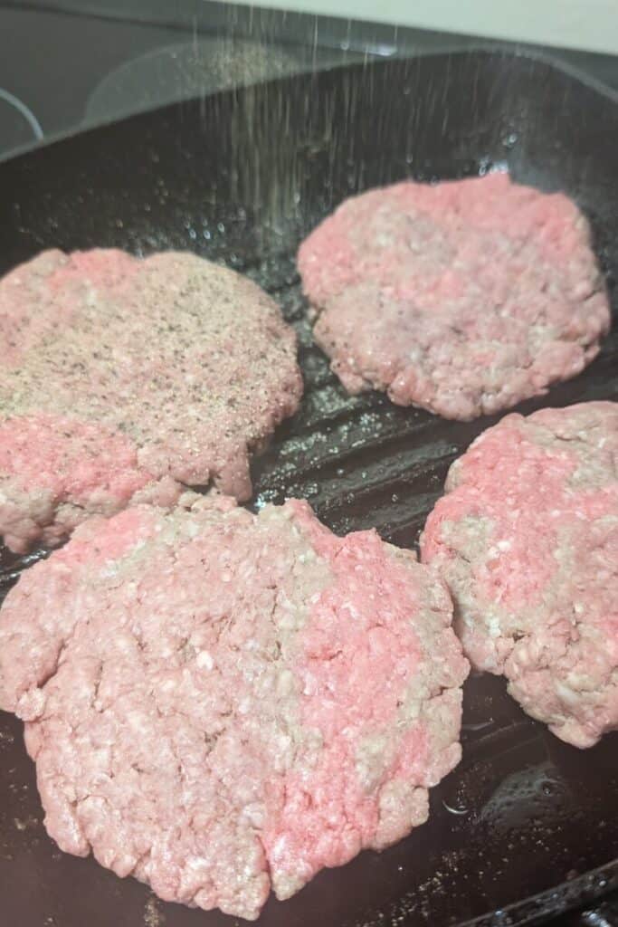 season plain burgers directly in the grill pan