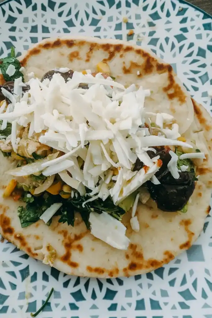 bbq chicken salad wrap with naan open