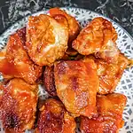 Honey Sriracha BBQ Sauced Air Fryer Chicken Thighs