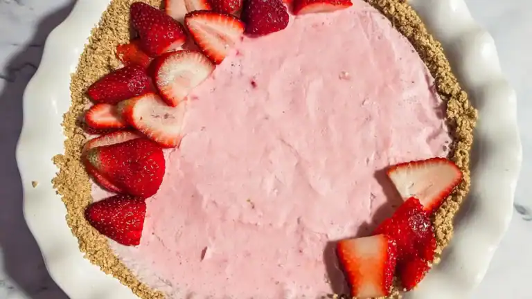 the top of the decorated frozen strawberry no bake pie