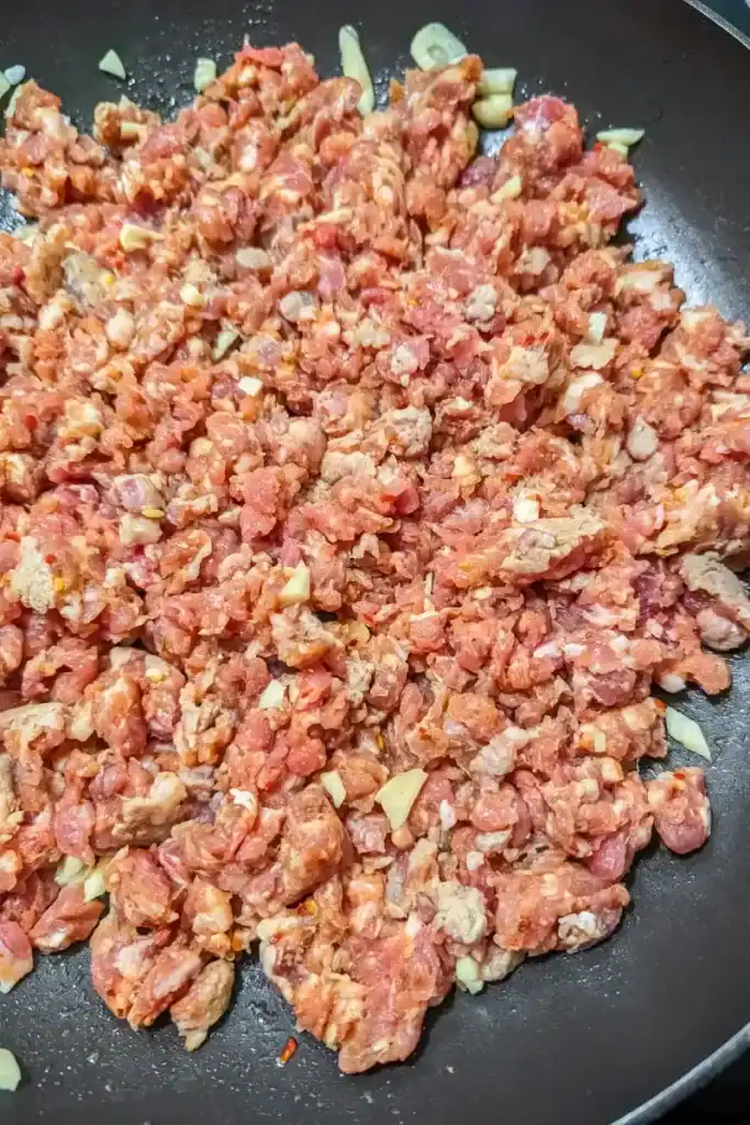 ground sausage in frying pan