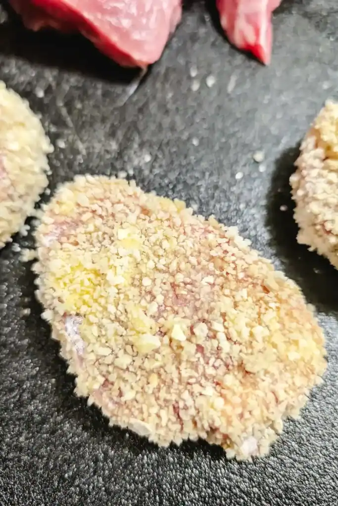 panko coated uncooked pork medallion