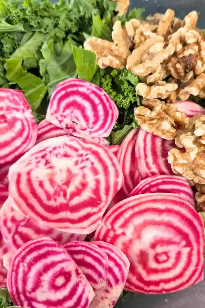 the beets kale and walnuts in salad bowl
